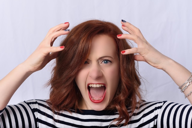 angry woman with dark hair